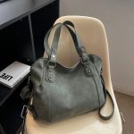 sac a main en daim bleu vert