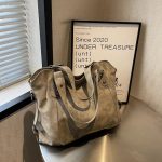 sac a main en daim gris beige