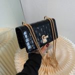 sac à main noir effet croco bandoulière chaîne